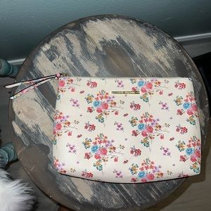 Steve Madden large floral makeup case used